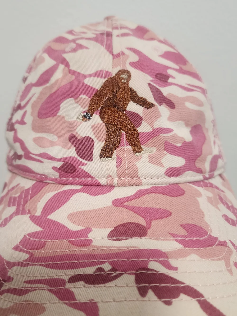 Pink Camo Baseball Cap with Brown Sasquatch Patch